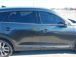 2020 Mazda CX-9 Grand Touring with VIN JM3TCADY1L0417651, listed as a IAAI auction lot 42334867 with 105,236 mi miles and . Bid and sale history available at DreamBid. Image 13.