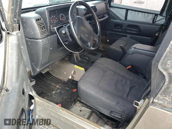2003 Jeep Wrangler X с VIN 1J4FA39S03P349713, выставлен на аукционе Copart как лот 55768995 с пробегом 187 266 миль миль и Списание • Salvage title. История ставок и продаж доступна на DreamBid. Изображение 8.