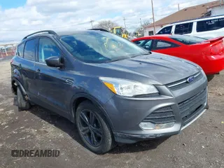 2014 Ford Escape SE with VIN 1FMCU9GX3EUB26129, listed as a IAAI auction lot 41987470 with 139,005 mi miles. Bid and sale history available at carsss.com. Image 1.