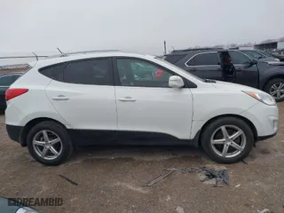 2013 Hyundai Tucson GLS with VIN KM8JU3AC2DU561443, listed as a IAAI auction lot 41600727 with 179,694 mi miles. Bid and sale history available at carsss.com. Image 13.