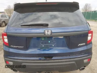 2021 Honda Passport EX-L z VIN 5FNYF8H55MB023278, wystawiony jako IAAI lot #42060014 z przebiegiem 51 674 mil mil oraz . Historia ofert i sprzedaży dostępna na DreamBid. Obrazek 16.