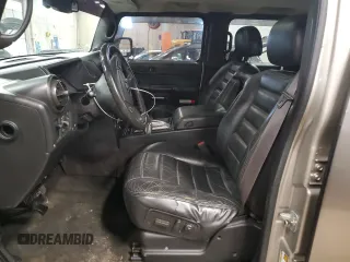 2005 Hummer H2 SUV with VIN 5GRGN23U05H103176, listed as a Copart auction lot 44365545 with 165,887 mi miles and Salvage Title. Bid and sale history available at carsss.com. Image 7.