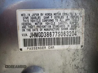 2007 Honda Fit Sport with VIN JHMGD38677S063204, listed as a Copart auction lot 48680995 with 233,496 mi miles and Salvage Title. Bid and sale history available at carsss.com. Image 12.