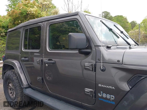 2021 Jeep Wrangler Unlimited Sahara with VIN 1C4JJXP60MW704738, listed as a IAAI auction lot 42042079 with 63,765 mi miles and . Bid and sale history available at DreamBid. Image 13.