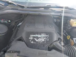 2003 Ford Thunderbird Deluxe z VIN 1FAHP60A33Y110451, wystawiony jako IAAI lot #42133863 z przebiegiem Nie podano mil oraz . Historia ofert i sprzedaży dostępna na DreamBid. Obrazek 10.