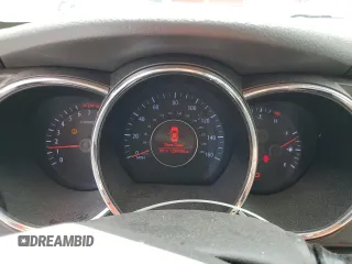 2013 Kia Optima LX z VIN KNAGM4A74D5380729, wystawiony jako Copart lot #56555835 z przebiegiem 126 904 mil mil oraz Szkoda całkowita • Salvage title. Historia ofert i sprzedaży dostępna na DreamBid. Obrazek 9.
