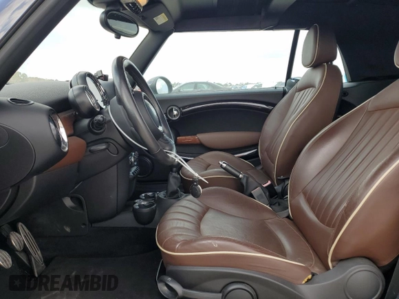 2011 MINI Convertible S with VIN WMWZP3C58BTX83725, listed as a Copart auction lot 44418965 with 45,401 mi miles and Salvage title. Bid and sale history available at DreamBid. Image 7.