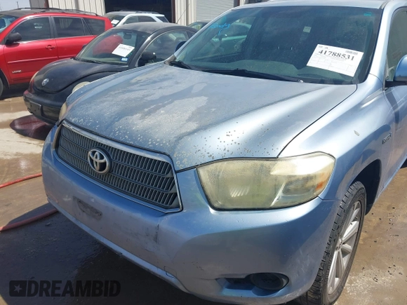 2009 Toyota Highlander Hybrid with VIN JTEEW41AX92033863, listed as a IAAI auction lot 41788531 with 215,787 mi miles. Bid and sale history available at carsss.com. Image 6.