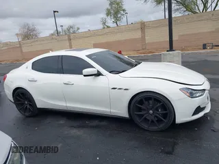 2014 Maserati Ghibli S Q4 with VIN ZAM57RTA3E1090350, listed as a IAAI auction lot 42056682 with 119,160 mi miles and . Bid and sale history available at DreamBid. Image 14.
