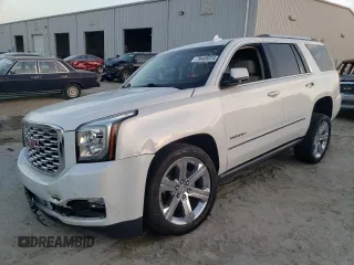 2019 GMC Yukon Denali with VIN 1GKS1CKJ9KR322958, listed as a Copart auction lot 79485874 with 86,512 mi miles and Salvage Title. Bid and sale history available at carsss.com. Image 1.