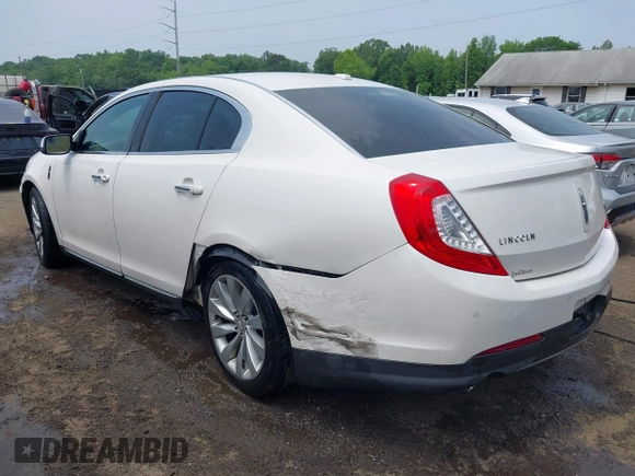 2013 Lincoln MKS with VIN 1LNHL9DK6DG600928, listed as a IAAI auction lot 42502424 with 194,015 mi miles and . Bid and sale history available at DreamBid. Image 3.