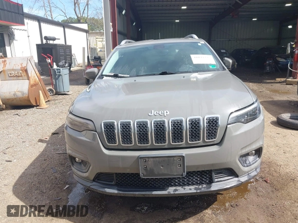 2020 Jeep Cherokee Latitude Plus with VIN 1C4PJMLB1LD608591, listed as a IAAI auction lot 41833275 with 90,838 mi miles and . Bid and sale history available at DreamBid. Image 12.
