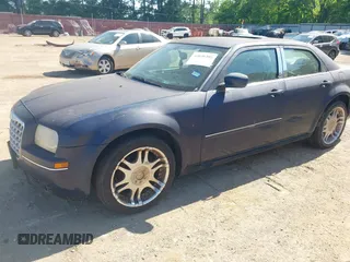 2006 Chrysler 300 Touring with VIN 2C3KA53G86H112808, listed as a IAAI auction lot 42036392 with Not Provided miles. Bid and sale history available at carsss.com. Image 2.
