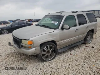 2004 GMC Yukon SLT with VIN 1GKEC13Z34R313210, listed as a Copart auction lot 51150575 with 328,961 mi miles and Salvage Title. Bid and sale history available at carsss.com. Image 1.