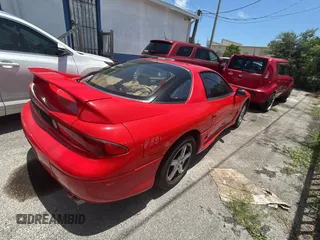 1999 Mitsubishi 3000GT GT z VIN JA3AM84J3XY001387, wystawiony jako Copart lot #61198735 z przebiegiem 137 514 mil mil oraz Czysty tytuł • Clean title. Historia ofert i sprzedaży dostępna na DreamBid. Obrazek 4.