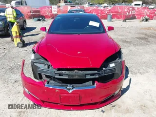 2018 Tesla Model S 75D with VIN 5YJSA1E2XJF295777, listed as a IAAI auction lot 41694540 with 70,428 mi miles and . Bid and sale history available at DreamBid. Image 13.