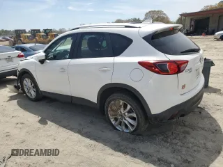 2015 Mazda CX-5 Grand Touring with VIN JM3KE4DY0F0458719, listed as a Copart auction lot 52960365 with 128,372 mi miles and Salvage Title. Bid and sale history available at DreamBid. Image 2.