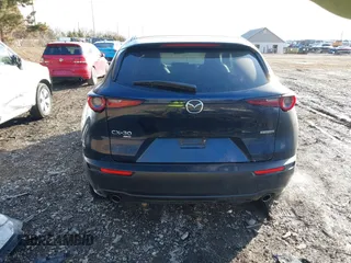 2020 Mazda CX-30 Select with VIN 3MVDMBCL9LM126154, listed as a IAAI auction lot 41492799 with 51,977 mi miles and . Bid and sale history available at DreamBid. Image 17.