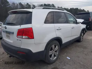 2012 Kia Sorento EX with VIN 5XYKU4A23CG303020, listed as a IAAI auction lot 41453881 with 242,131 mi miles. Bid and sale history available at carsss.com. Image 4.