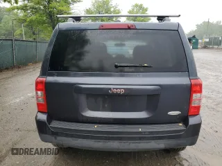 2014 Jeep Patriot Latitude with VIN 1C4NJPFA1ED651021, listed as a Copart auction lot 56947445 with 137,239 mi miles and Salvage title. Bid and sale history available at DreamBid. Image 6.