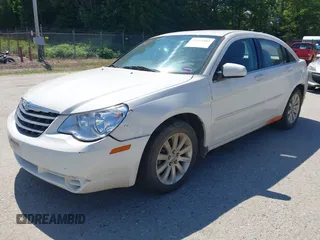 2010 Chrysler Sebring Limited with VIN 1C3CC5FD9AN199621, listed as a IAAI auction lot 42616882 with 110,512 mi miles and . Bid and sale history available at DreamBid. Image 2.