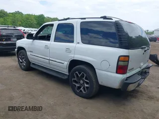 2005 GMC Yukon SLT z VIN 1GKEC13T75R114660, wystawiony jako IAAI lot #42223845 z przebiegiem 199 064 mil mil oraz . Historia ofert i sprzedaży dostępna na DreamBid. Obrazek 3.