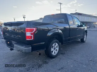 2018 Ford F-150 XL with VIN 1FTEX1CB0JKF17440, listed as a IAAI auction lot 42019621 with 168,007 mi miles. Bid and sale history available at carsss.com. Image 4.