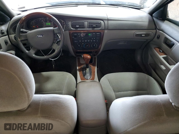 2006 Ford Taurus with VIN 1FAHP56U46A162809, listed as a Copart auction lot 60476125 with 95,542 mi miles and Salvage title. Bid and sale history available at DreamBid. Image 8.