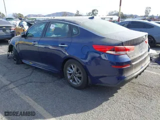 2019 Kia Optima LX with VIN 5XXGT4L36KG344839, listed as a IAAI auction lot 41399595 with 71,007 mi miles. Bid and sale history available at carsss.com. Image 3.