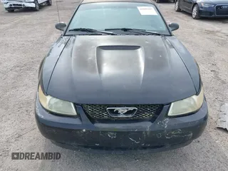2000 Ford Mustang with VIN 1FAFP4048YF163834, listed as a IAAI auction lot 42090407 with 161,928 mi miles. Bid and sale history available at carsss.com. Image 6.