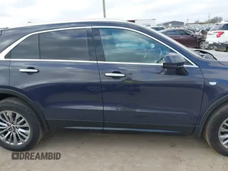 2025 Cadillac XT4 FWD Premium Luxury with VIN 1GYFZCR43SF151884, listed as a IAAI auction lot 41521510 with 2,339 mi miles and . Bid and sale history available at DreamBid. Image 13.
