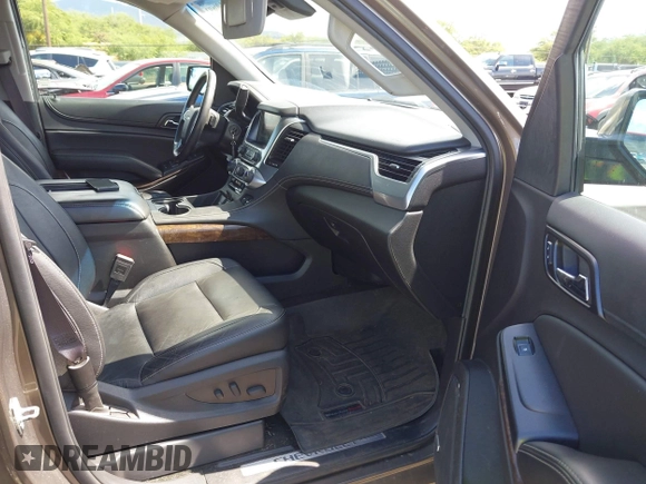 2016 Chevrolet Tahoe LT z VIN 1GNSKBKC3GR388683, wystawiony jako IAAI lot #42100692 z przebiegiem 87 858 mil mil oraz . Historia ofert i sprzedaży dostępna na DreamBid. Obrazek 5.