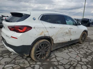 2022 BMW X2 sDrive28i with VIN WBXYH9C0XN5U53700, listed as a Copart auction lot 80884664 with 0 mi miles and Salvage Title. Bid and sale history available at carsss.com. Image 3.