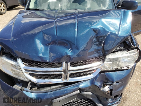2013 Dodge Journey SXT with VIN 3C4PDCCG1DT637534, listed as a Copart auction lot 56992205 with 128,531 mi miles and Clean title. Bid and sale history available at DreamBid. Image 12.