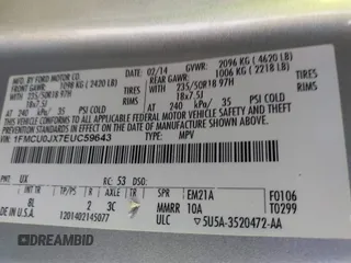 2014 Ford Escape Titanium with VIN 1FMCU0JX7EUC59643, listed as a IAAI auction lot 41082952 with 143,899 mi miles. Bid and sale history available at carsss.com. Image 9.