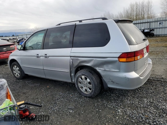 2002 Honda Odyssey EX z VIN 2HKRL18692H578746, wystawiony jako Copart lot #51281845 z przebiegiem 282 844 mil mil oraz Szkoda całkowita • Salvage title. Historia ofert i sprzedaży dostępna na DreamBid. Obrazek 2.