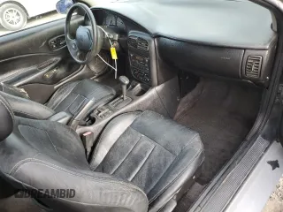 2001 Saturn SC z VIN 1G8ZY14701Z255767, wystawiony jako Copart lot #53727985 z przebiegiem 137 776 mil mil oraz Szkody całkowita. Historia ofert i sprzedaży dostępna na DreamBid. Obrazek 8.