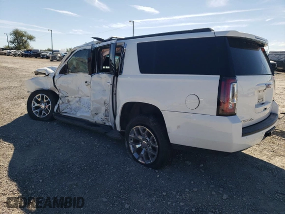 2015 GMC Yukon XL SLE z VIN 1GKS1GKC1FR643293, wystawiony jako Copart lot #82106544 z przebiegiem 164 623 mil mil oraz Szkoda całkowita • Salvage title. Historia ofert i sprzedaży dostępna na DreamBid. Obrazek 2.