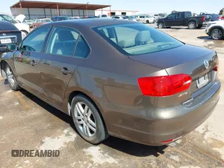 2014 Volkswagen Jetta S with VIN 3VW2K7AJ8EM319182, listed as a IAAI auction lot 42180101 with 133,495 mi miles and . Bid and sale history available at DreamBid. Image 3.