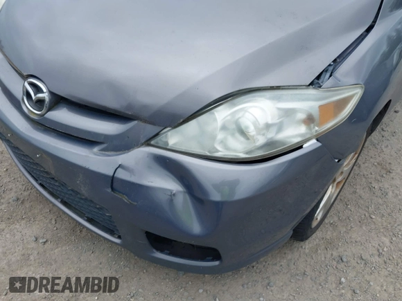 2007 Mazda 5 Touring with VIN JM1CR293570137215, listed as a IAAI auction lot 42497432 with 135,025 mi miles and . Bid and sale history available at DreamBid. Image 6.