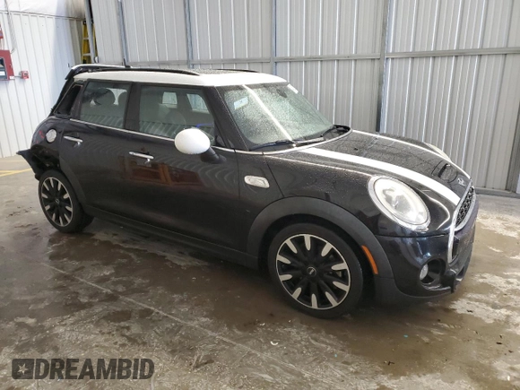 2017 MINI Hardtop 4 Door Cooper S z VIN WMWXU3C33H2F49198, wystawiony jako Copart lot #45210935 z przebiegiem 139 332 mil mil oraz Szkody całkowita. Historia ofert i sprzedaży dostępna na DreamBid. Obrazek 4.