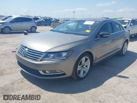 2013 Volkswagen CC Sport with VIN WVWBN7AN2DE555375, listed as a IAAI auction lot 42048643 with 125,484 mi miles and . Bid and sale history available at DreamBid. Image 2.