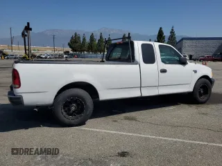 2003 Ford F-150 XL with VIN 1FTRX17W53NA54971, listed as a Copart auction lot 63686385 with 133,800 mi miles and Salvage title. Bid and sale history available at DreamBid. Image 3.