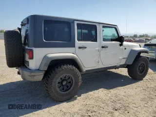 2009 Jeep Wrangler Unlimited Rubicon with VIN 1J8GA69149L767218, listed as a Copart auction lot 59342825 with 157,307 mi miles and Salvage title. Bid and sale history available at DreamBid. Image 3.