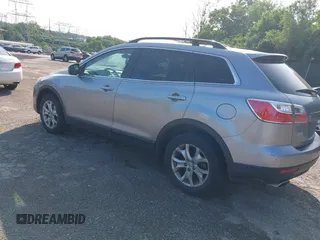 2012 Mazda CX-9 Touring with VIN JM3TB3CV7C0365934, listed as a IAAI auction lot 42381671 with 237,298 mi miles and . Bid and sale history available at DreamBid. Image 3.