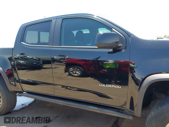 2018 Chevrolet Colorado 4WD ZR2 z VIN 1GCGTEEN5J1259764, wystawiony jako IAAI lot #42474810 z przebiegiem 111 187 mil mil oraz . Historia ofert i sprzedaży dostępna na DreamBid. Obrazek 14.