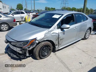 2023 Toyota Corolla LE with VIN 5YFB4MDE7PP012267, listed as a IAAI auction lot 41891314 with 51,419 mi miles and . Bid and sale history available at DreamBid. Image 18.
