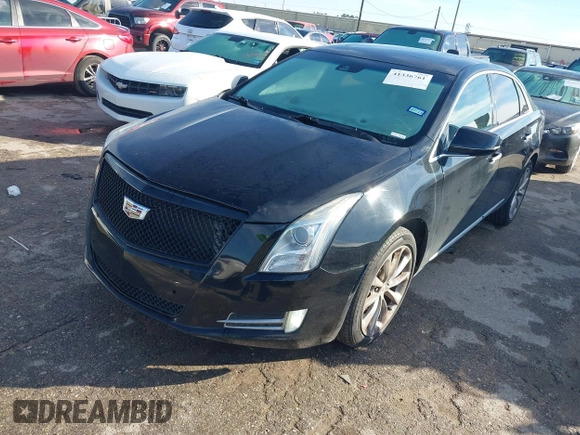 2013 Cadillac XTS Luxury with VIN 2G61P5S34D9237884, listed as a IAAI auction lot 41336761 with 156,830 mi miles and . Bid and sale history available at DreamBid. Image 2.