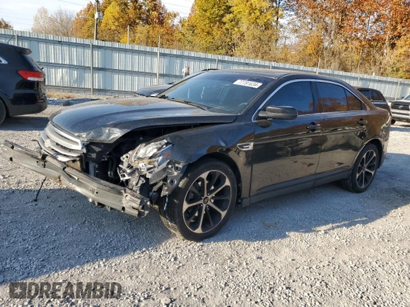 2015 Ford Taurus SEL z VIN 1FAHP2E85FG151155, wystawiony jako Copart lot #77791634 z przebiegiem 224 144 mil mil oraz Szkody całkowita. Historia ofert i sprzedaży dostępna na DreamBid. Obrazek 1.