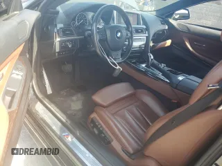 2013 BMW 6 Series 650i z VIN WBAYM9C54DDW20137, wystawiony jako Copart lot #54526085 z przebiegiem 57 593 mil mil oraz Szkoda całkowita • Salvage title. Historia ofert i sprzedaży dostępna na DreamBid. Obrazek 8.